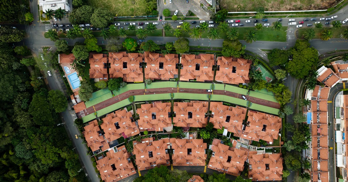 What kind of cars for F roads and river crossing during summer in Iceland? - Aerial View of Green Trees and Brown Concrete Building What kind of cars for F roads and river crossing during summer in Iceland? - Aerial View of Green Trees and Brown Concrete Building