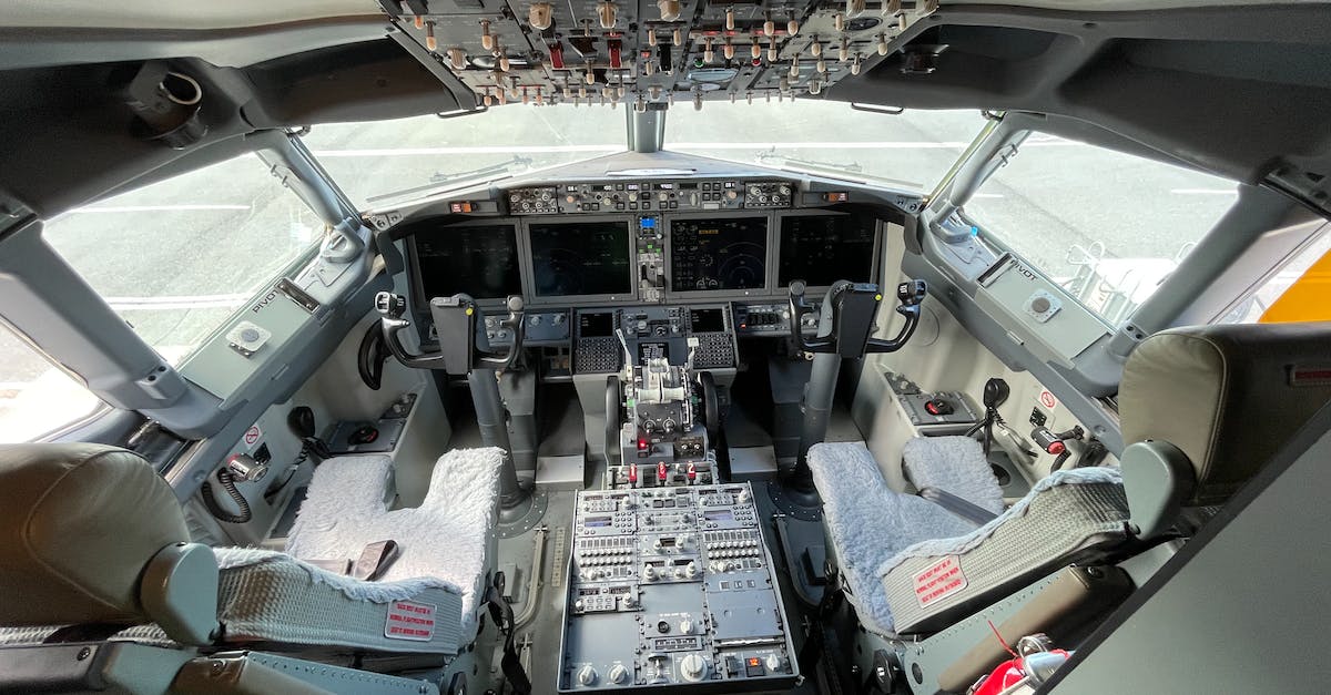 What kind of power sockets do Jet Airways' Boeing 777s have? - Free stock photo of aircraft, aircraft cabin, aircraft door