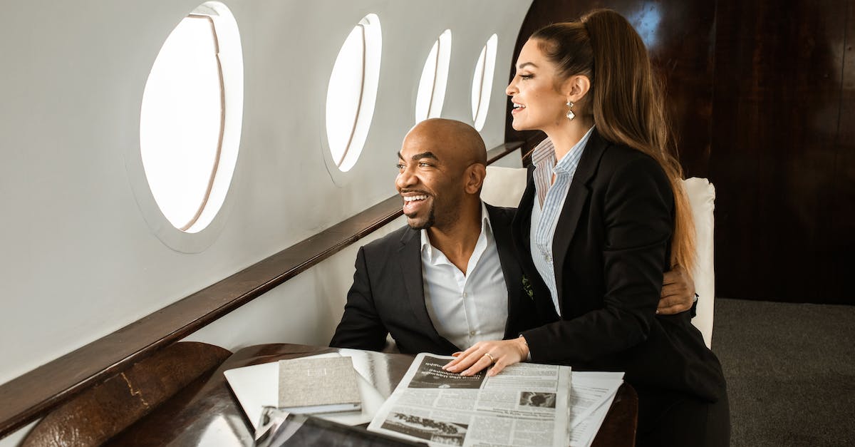 What section of an airplane offers the smoothest ride? - A Couple Sitting by the Airplane Window What section of an airplane offers the smoothest ride? - A Couple Sitting by the Airplane Window