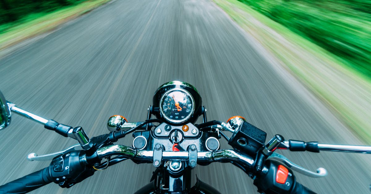 What should I bring for a lightweight motorcycle trip across Vietnam? [closed] - Black Motorcycle on Road