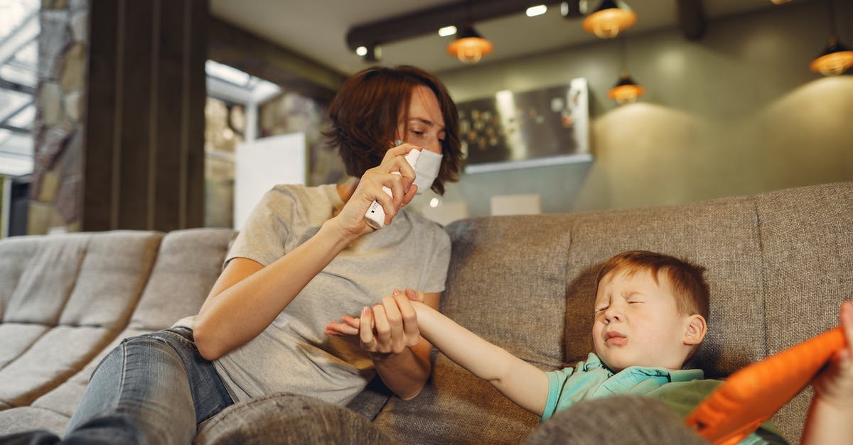 What should I do stay a little bit more or going abroad after my internship? [closed] - Mother with spray taking hand of wrinkled son at home