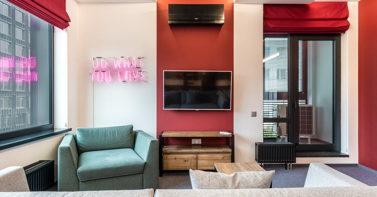 What time zone do trains in Russia operate on? - Interior of modern office lounge zone with sofa and armchair with table near window next to TV on wall and neon signboard with text do what you love near door What time zone do trains in Russia operate on? - Interior of modern office lounge zone with sofa and armchair with table near window next to TV on wall and neon signboard with text do what you love near door