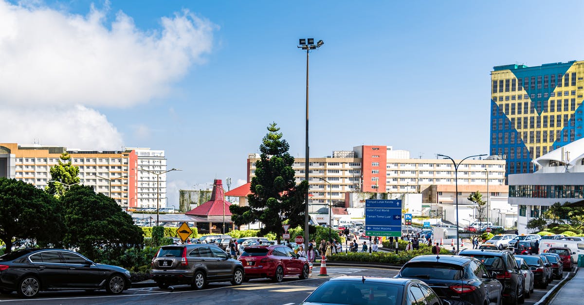 What to do when in Malaysia and visa expires during lockdown? - Cars Parked on Parking Lot What to do when in Malaysia and visa expires during lockdown? - Cars Parked on Parking Lot
