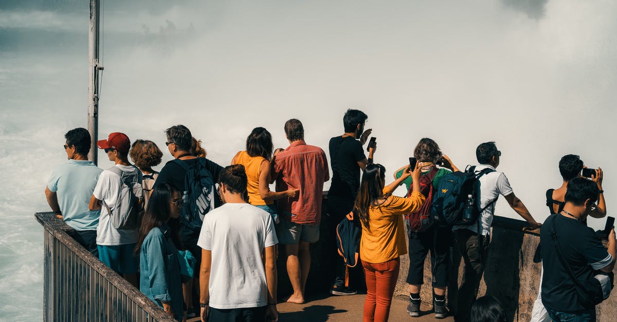 What to wear in Switzerland in July? - People Standing on Viewing Platform What to wear in Switzerland in July? - People Standing on Viewing Platform