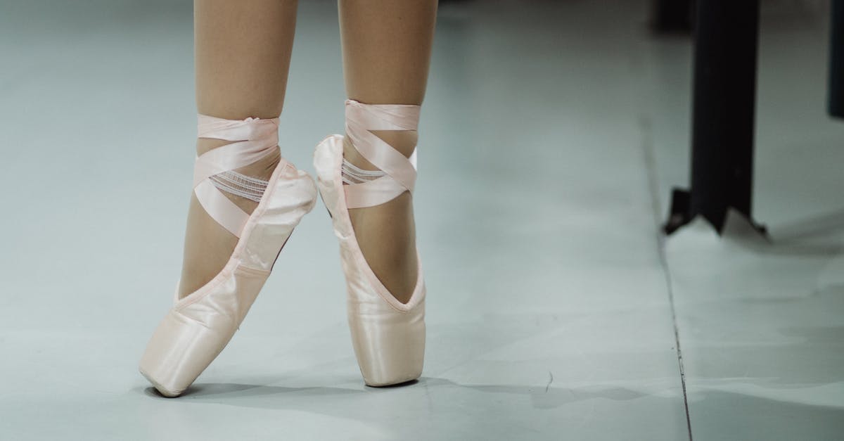What US Visa do I need to perform in a theatre - Crop faceless ballerina standing on toes What US Visa do I need to perform in a theatre - Crop faceless ballerina standing on toes