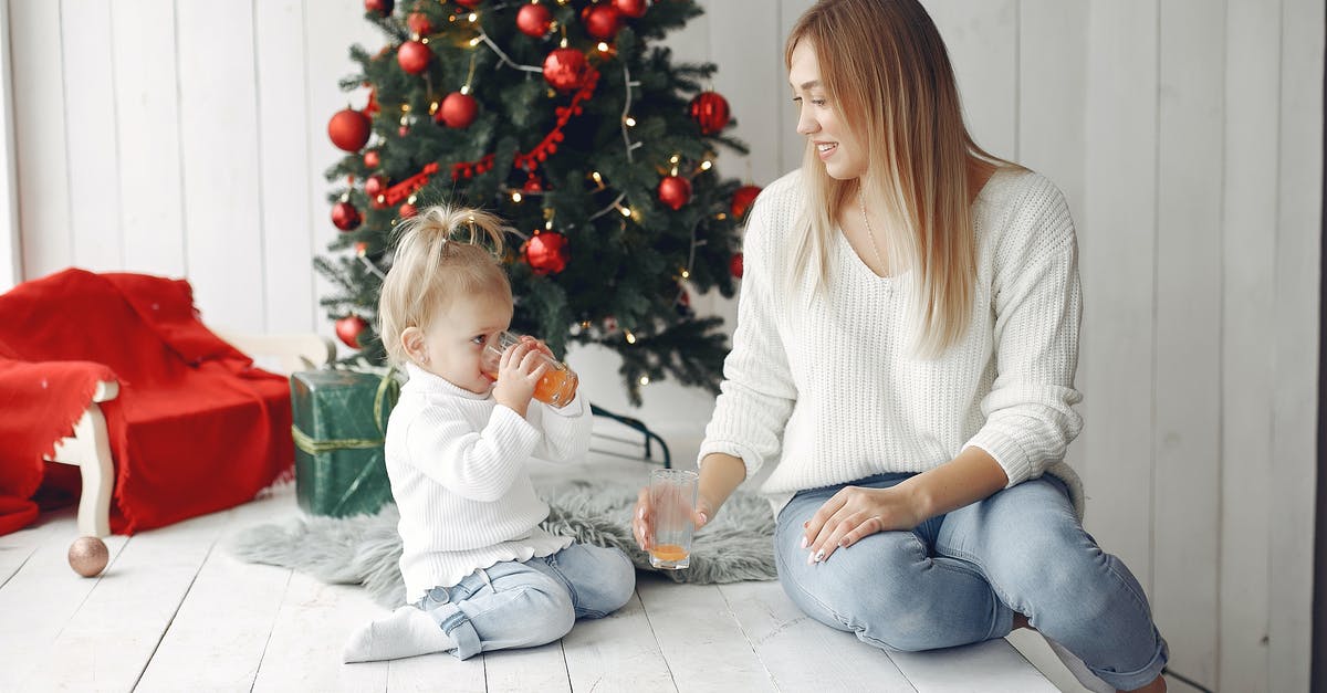 What visa does family need to holiday in New Zealand? - Mother and Daughter Sitting near Fir Tree What visa does family need to holiday in New Zealand? - Mother and Daughter Sitting near Fir Tree
