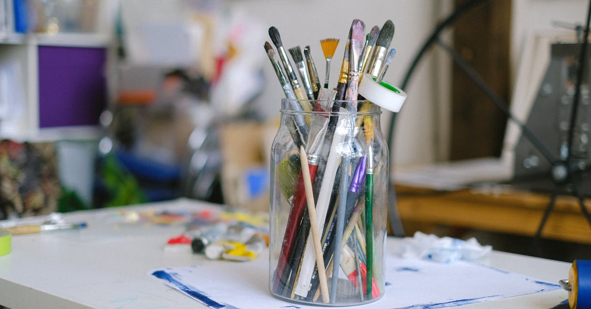 What were the indefinite validity visas that used to be issued by the US before VWP was created? - Glass jar with paintbrushes on desk with paint tubes in professional art workshop What were the indefinite validity visas that used to be issued by the US before VWP was created? - Glass jar with paintbrushes on desk with paint tubes in professional art workshop