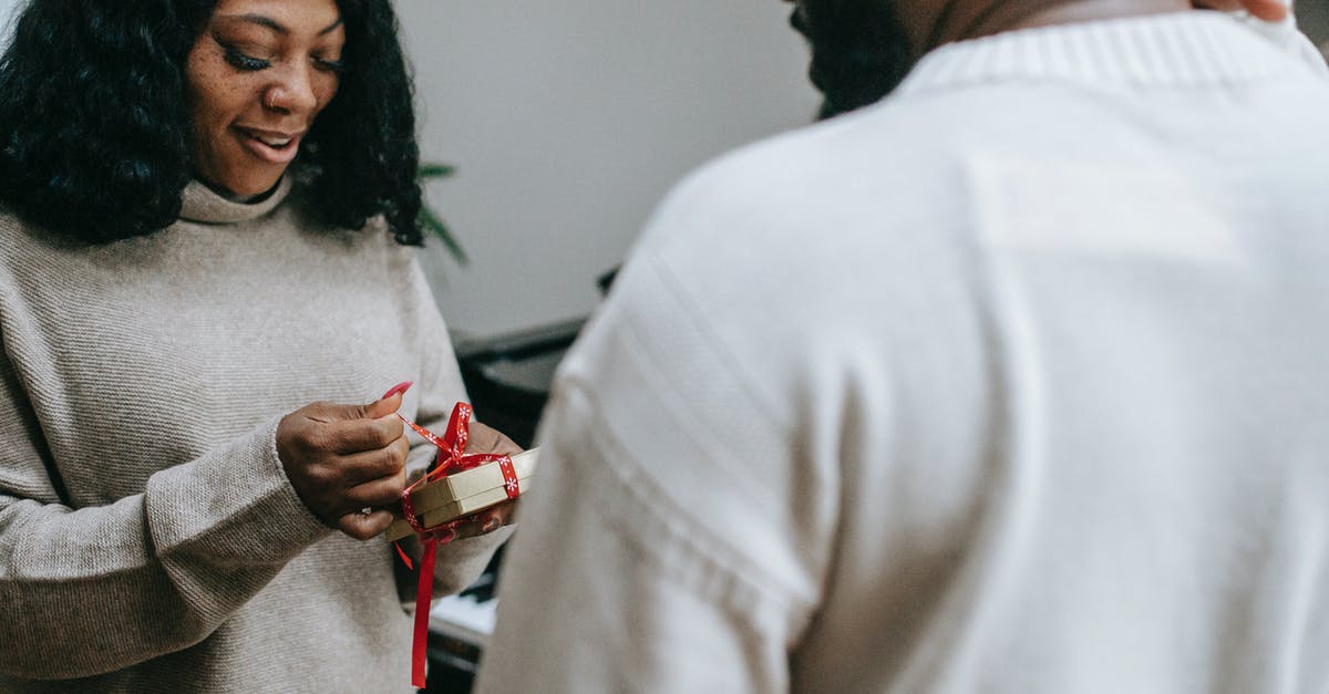 What will be open during Christmas in Bergen? - Black couple in sweaters congratulating each other on Christmas What will be open during Christmas in Bergen? - Black couple in sweaters congratulating each other on Christmas