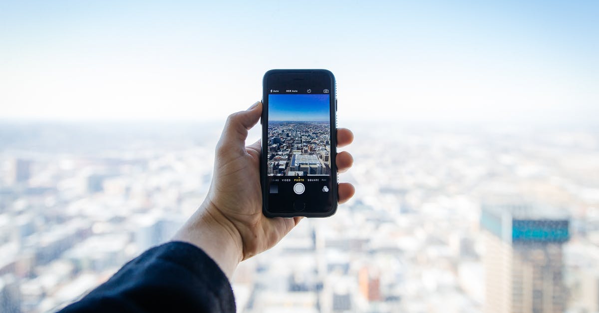 What will happen if I overstay in South Africa? - Person Holding Smartphone What will happen if I overstay in South Africa? - Person Holding Smartphone