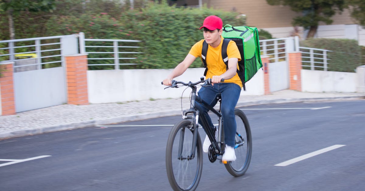 What would I need to do in order to visit the Gaza Strip? - Man in Green Shirt Riding on Black Bicycle on Road What would I need to do in order to visit the Gaza Strip? - Man in Green Shirt Riding on Black Bicycle on Road