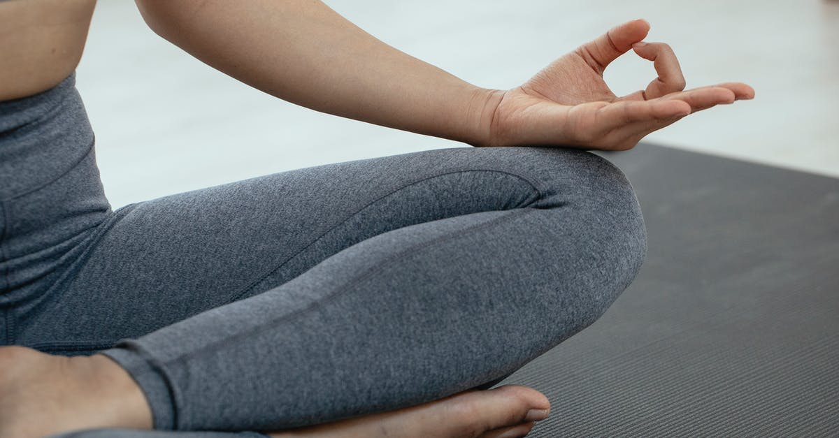 Whats the right type of visa to deliver a training session in Schengen zone? - Crop unrecognizable person in sportswear sitting on floor and meditating in lotus pose during yoga session Whats the right type of visa to deliver a training session in Schengen zone? - Crop unrecognizable person in sportswear sitting on floor and meditating in lotus pose during yoga session