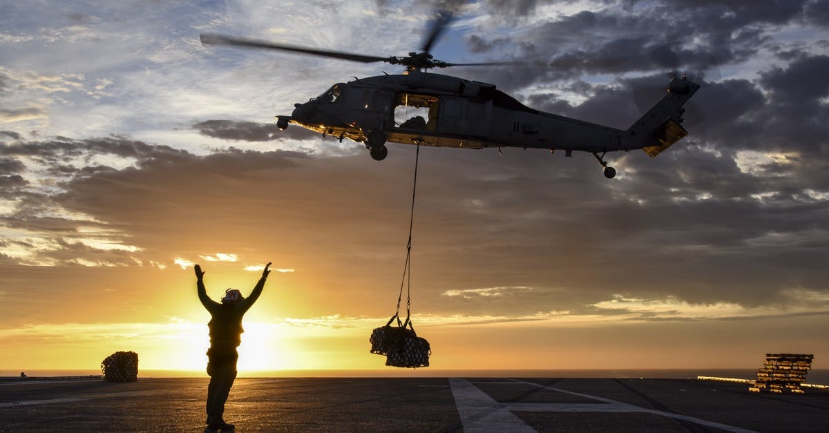 When and why do people clap/applaud after a plane lands? - Silhouette Man Standing on Road Against Sky during Sunset When and why do people clap/applaud after a plane lands? - Silhouette Man Standing on Road Against Sky during Sunset