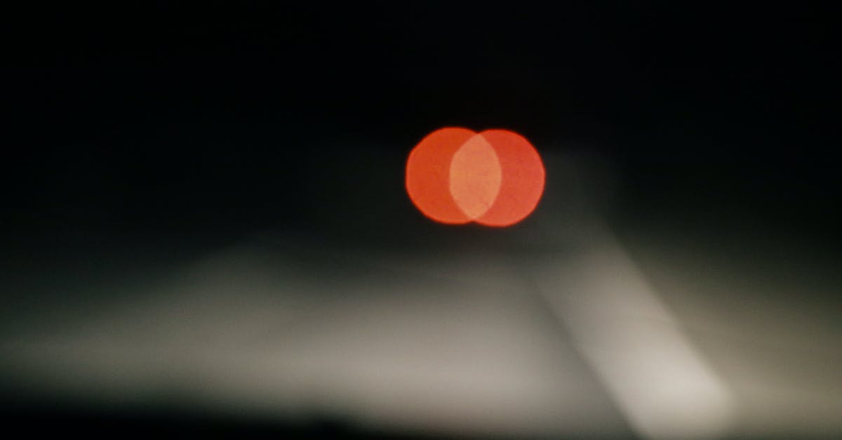 When I find a discount fare on AirAsia's website that includes a stop at KL, is there a way to book it with a few nights there for the same price? - Stop light of automobile on road at night