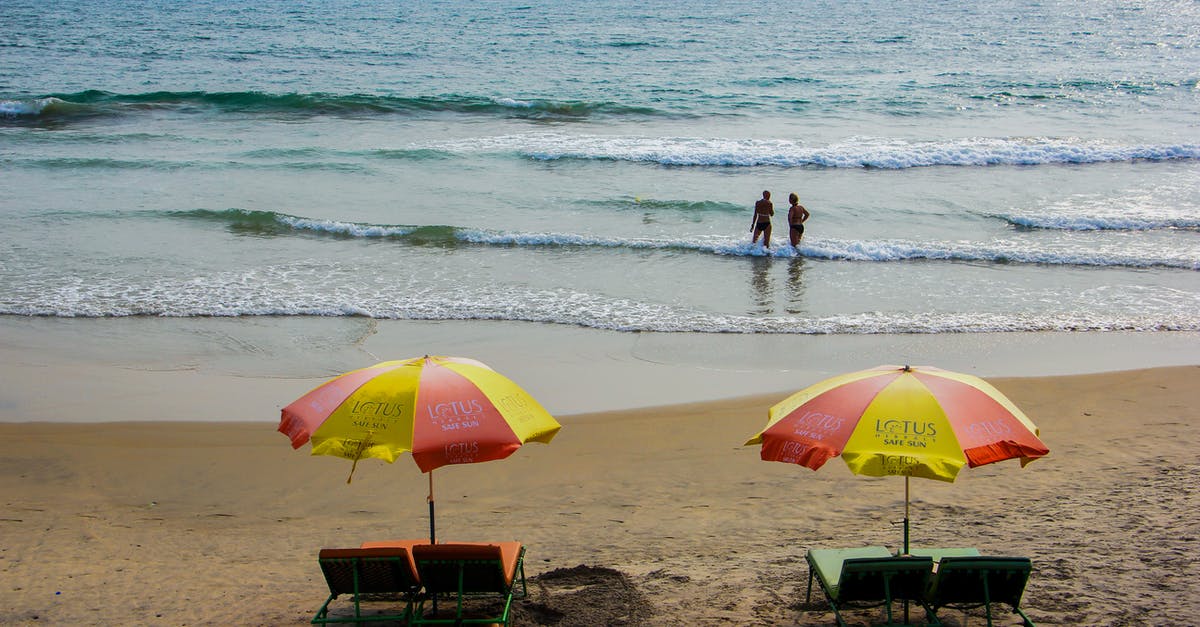 When is it Lobster Season in the Caribbean? - Two People Standing In Beach When is it Lobster Season in the Caribbean? - Two People Standing In Beach