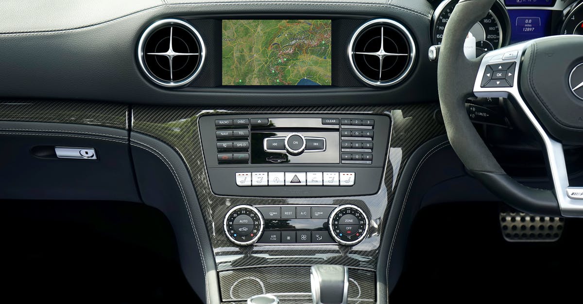 When planning to drive through Germany, what speed does the navigation system use for limitless highways? - Black and Gray Car Stereo