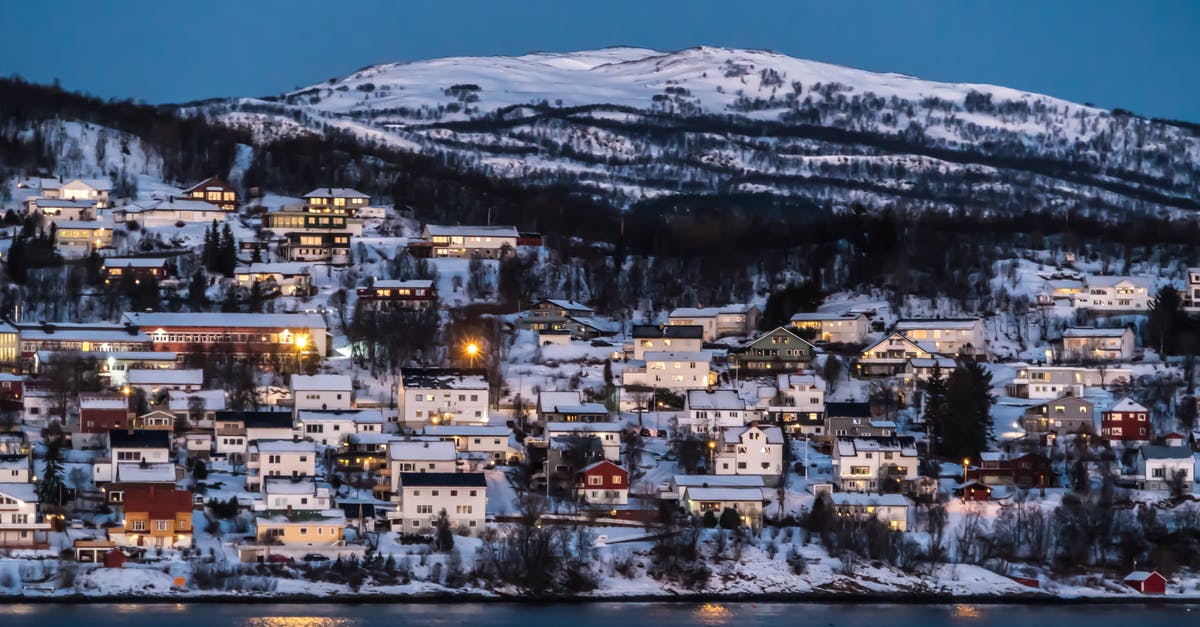 When travelling to Europe from India where should I buy my winter gear? - Birds Eye View of Village Beside Body of Water When travelling to Europe from India where should I buy my winter gear? - Birds Eye View of Village Beside Body of Water