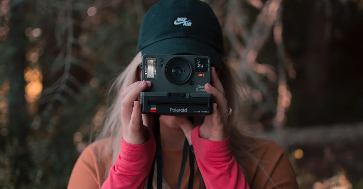 Where's this picture of a glacial moraine in autumn taken? - Woman Holding A Polaroid Camera Where's this picture of a glacial moraine in autumn taken? - Woman Holding A Polaroid Camera