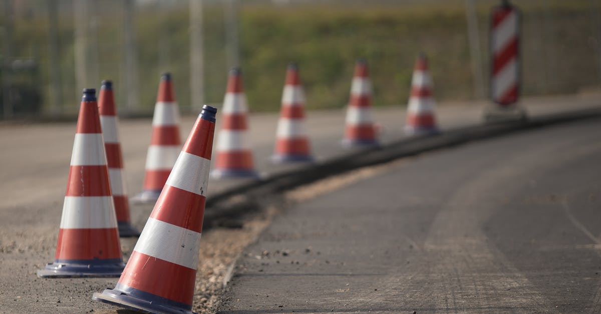 Where and why are there metric road signs in Arizona? - Red and White Traffic Cone on Road Where and why are there metric road signs in Arizona? - Red and White Traffic Cone on Road