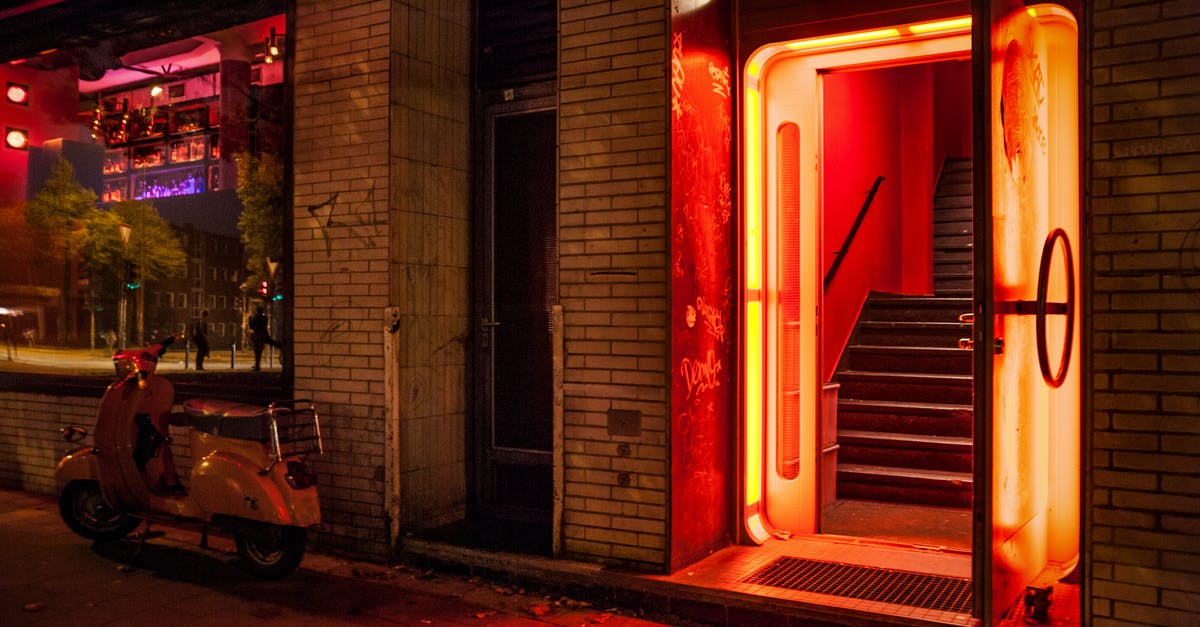 Where can I attend a fight night club in Manhattan? - White Motor Scooter Near Open Door Where can I attend a fight night club in Manhattan? - White Motor Scooter Near Open Door