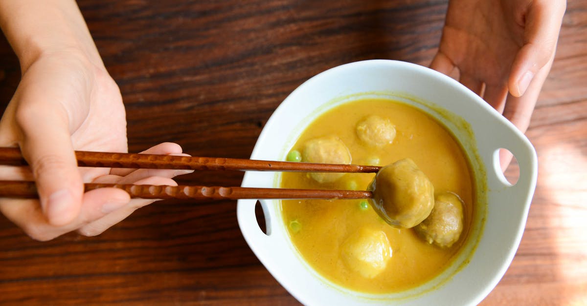 Where can I eat turtle excrement soup? - Person Holding Chopsticks and White Ceramic Bowl Where can I eat turtle excrement soup? - Person Holding Chopsticks and White Ceramic Bowl