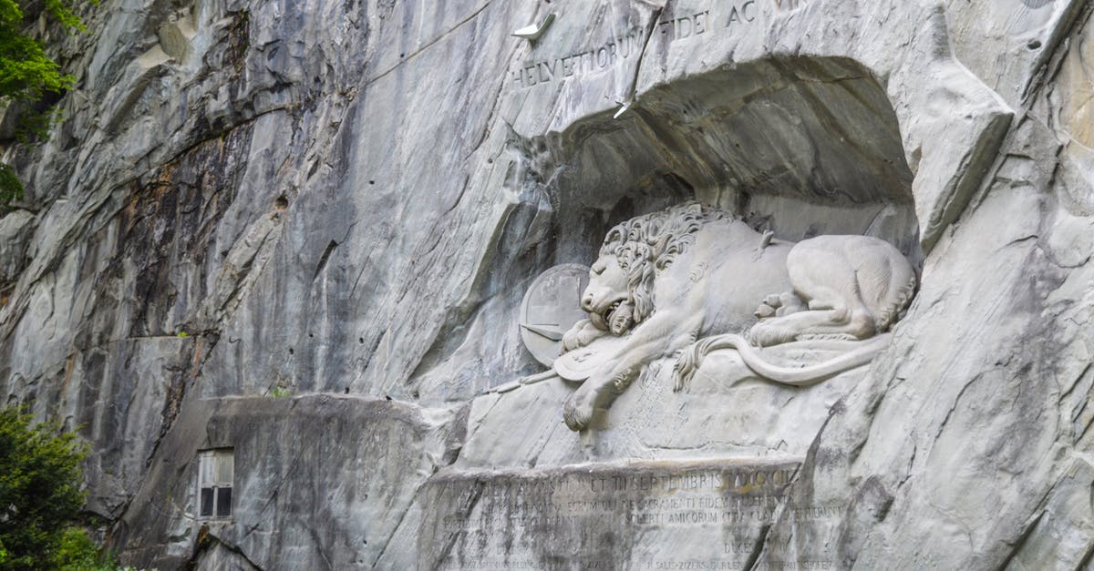 Where can I exchange Swiss Franc coins outside of Switzerland - Old stone sculpture of dying lion in Lucerne Where can I exchange Swiss Franc coins outside of Switzerland - Old stone sculpture of dying lion in Lucerne