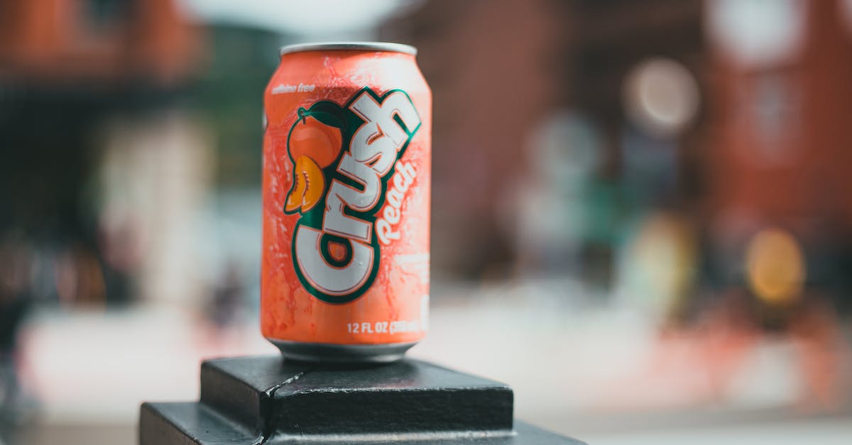 Where can I find a guidebook of Menorca? - Orange and White Dr Pepper Can on Black Wooden Table Where can I find a guidebook of Menorca? - Orange and White Dr Pepper Can on Black Wooden Table
