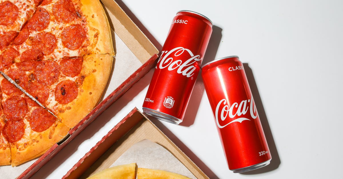 Where can I find a "Melty Cheese Wheel"? - Coca Cola Cans Beside Pizza Where can I find a "Melty Cheese Wheel"? - Coca Cola Cans Beside Pizza