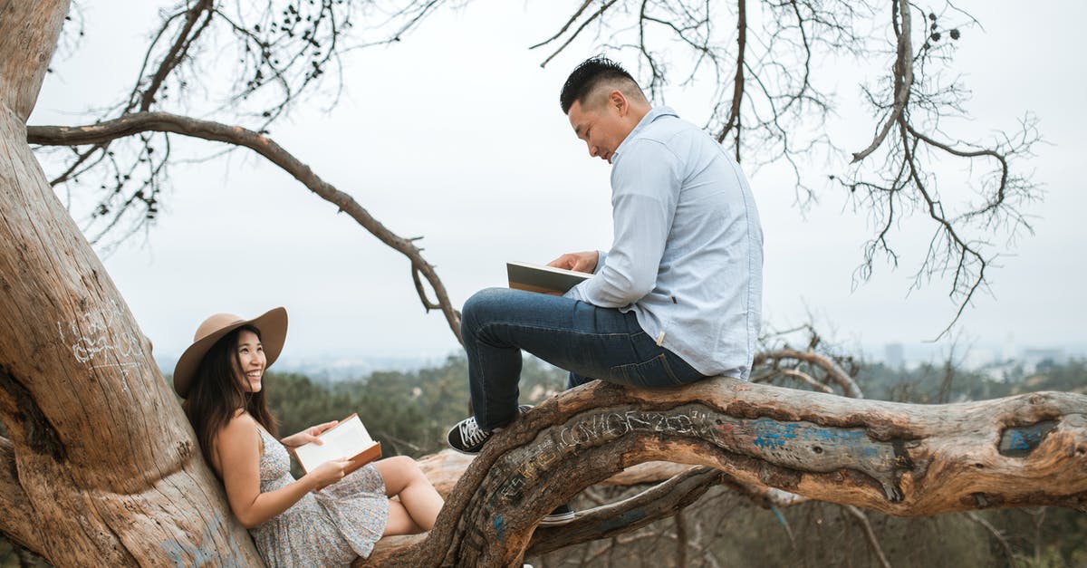 Where can I find and book plane tickets on date not on destination? - Couple Reading Books Outside Where can I find and book plane tickets on date not on destination? - Couple Reading Books Outside