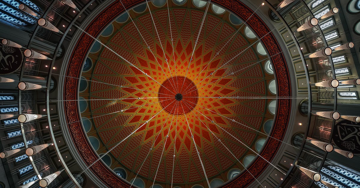 Where can I find the up-to-date schedule for the Yangon Circular Train? - Red and Black Round Ceiling
