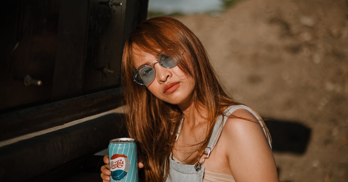 Where can I go looking for amber in Gdańsk, Poland? - Woman Holding Soda Can Where can I go looking for amber in Gdańsk, Poland? - Woman Holding Soda Can
