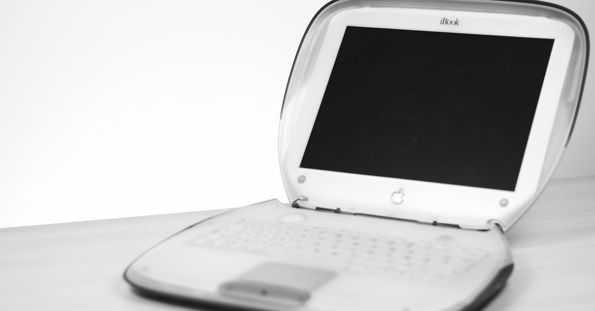 Where can I rent a computer monitor for two weeks in Hong Kong? - White Apple Laptop on Black Screen on White Surface Where can I rent a computer monitor for two weeks in Hong Kong? - White Apple Laptop on Black Screen on White Surface