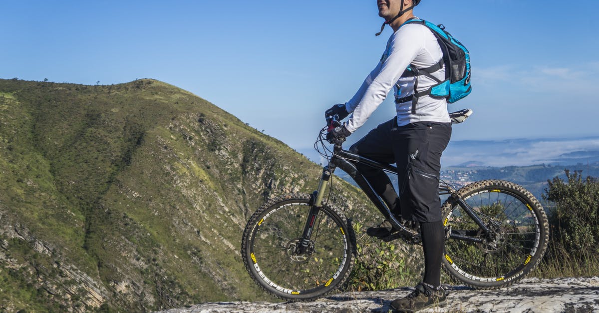 Where can I rent a mountain bike in Puerto Vallarta, Mexico? - Man With White Shirt Riding Abicycle on a Mountain Where can I rent a mountain bike in Puerto Vallarta, Mexico? - Man With White Shirt Riding Abicycle on a Mountain