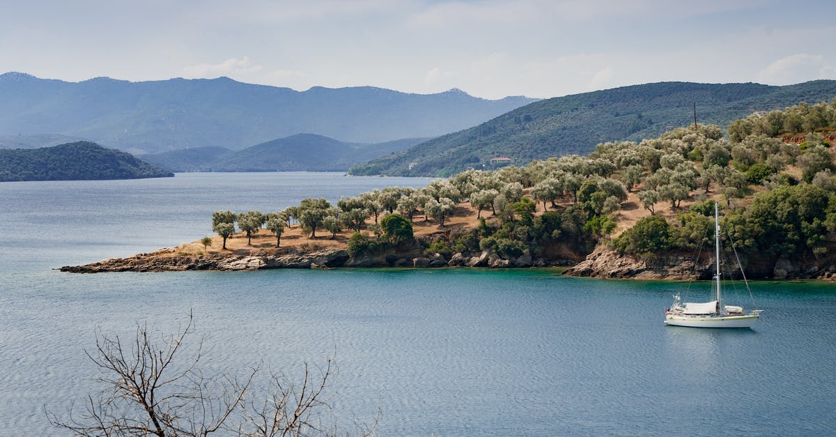 Where can I rent a sailing boat at Orava lake? - White Yacht on Body of Water Where can I rent a sailing boat at Orava lake? - White Yacht on Body of Water