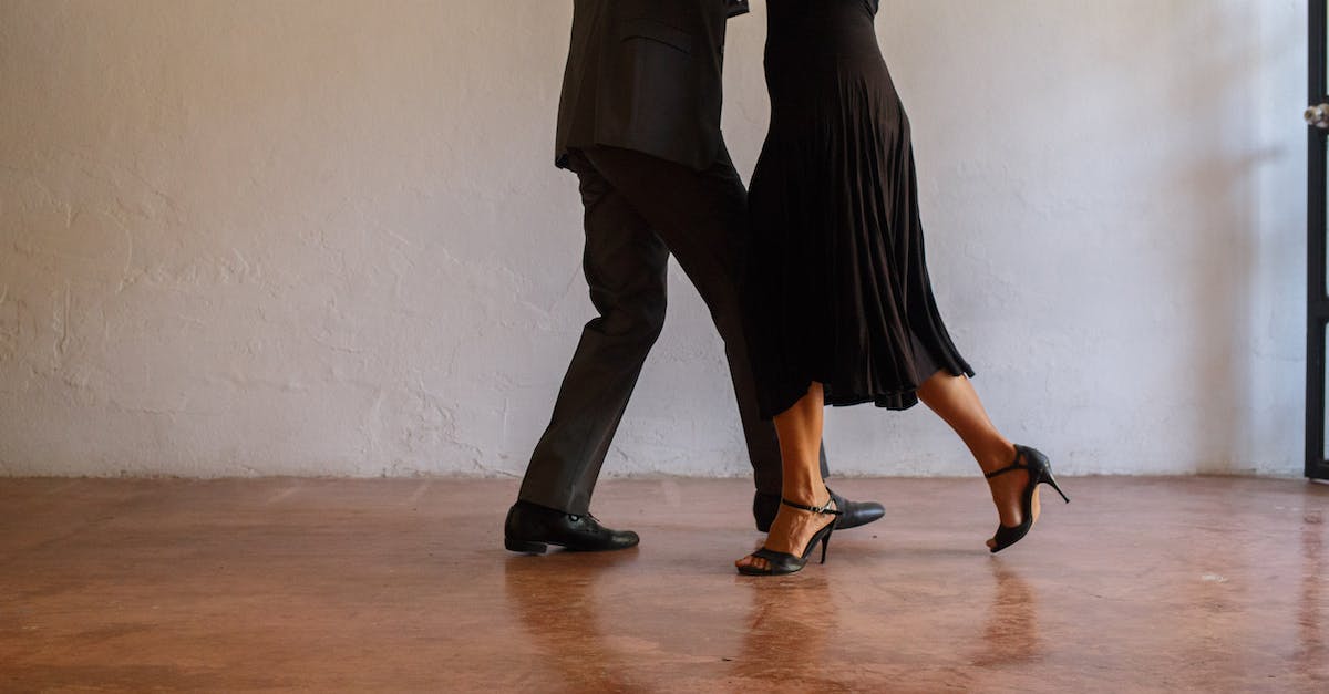 Where can I see a Mbalax performance in Dakar? - Woman in Black Dress and Black Leather Shoes Where can I see a Mbalax performance in Dakar? - Woman in Black Dress and Black Leather Shoes