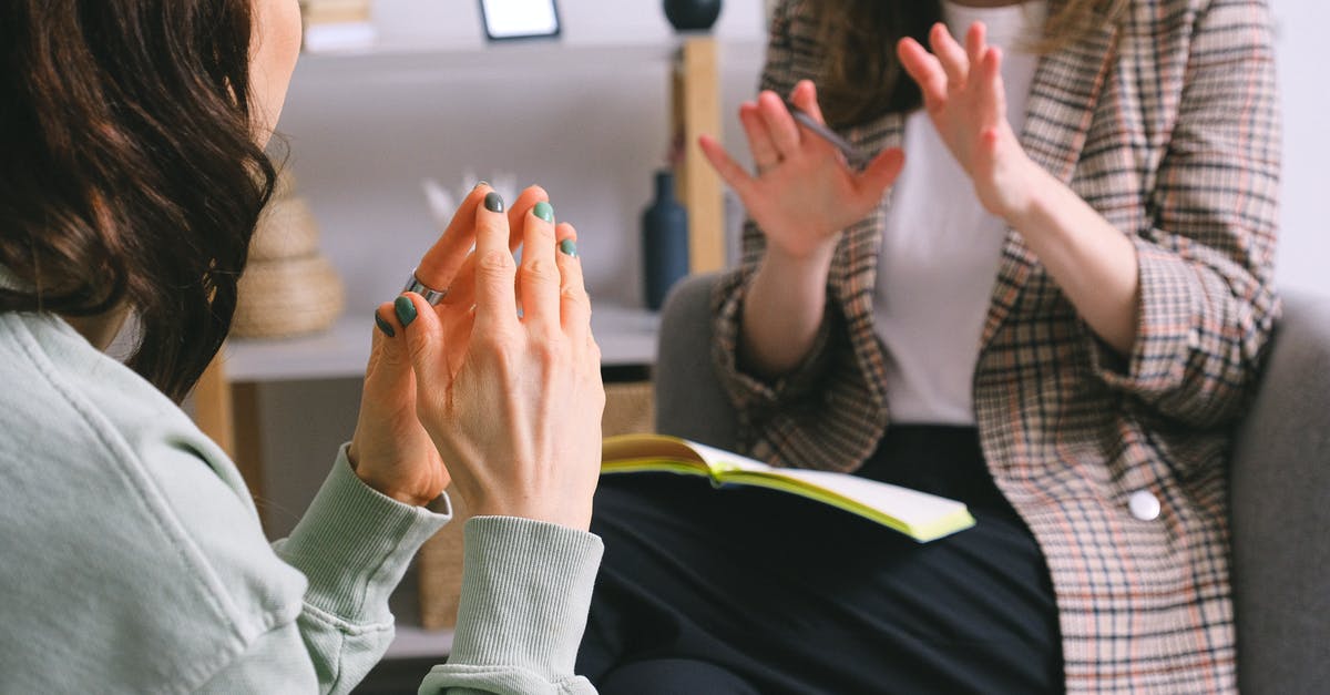 Where do Gamers visit in Tokyo? - Crop unrecognizable female psychologist and patient discussing mental problems during session Where do Gamers visit in Tokyo? - Crop unrecognizable female psychologist and patient discussing mental problems during session