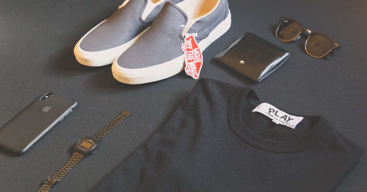 Where in Cluj can I play airsoft? - Pair of Gray Vans Low-top Sneakers Beside Black Shirt, Sunglasses, and Watch