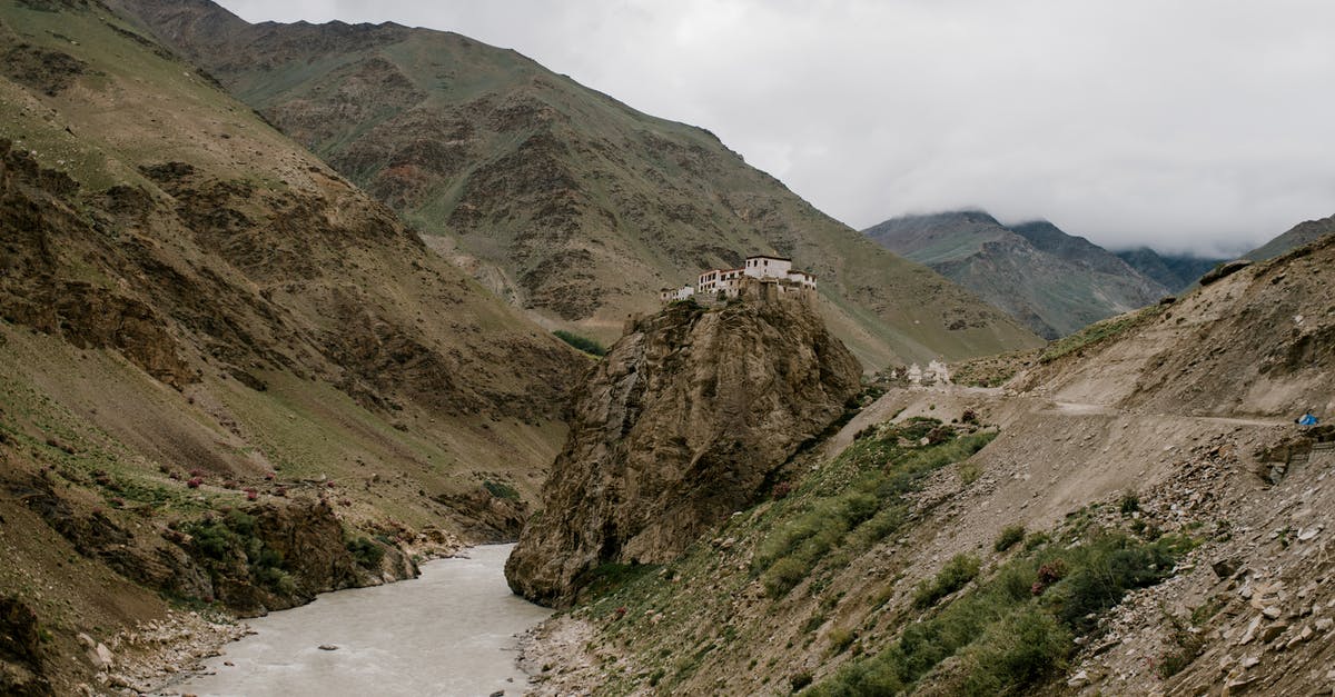 Where in India do I have the best chance of seeing wild tigers? - Picturesque scenery of wild river flowing among rough rocky mountains near old Buddhist Bardan Gompa monastery against foggy sky Where in India do I have the best chance of seeing wild tigers? - Picturesque scenery of wild river flowing among rough rocky mountains near old Buddhist Bardan Gompa monastery against foggy sky
