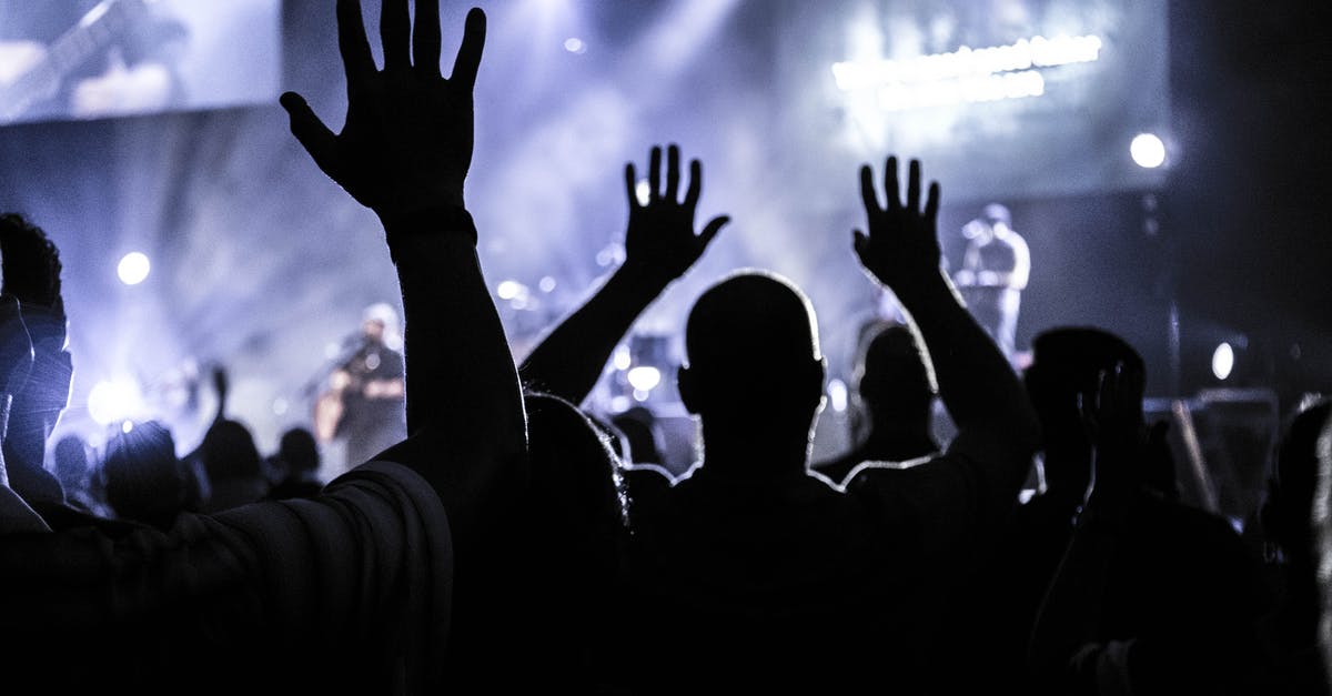 Where in London should you bring a fan of the band Madness? - Group of People Raising Hands Silhouette Photography Where in London should you bring a fan of the band Madness? - Group of People Raising Hands Silhouette Photography
