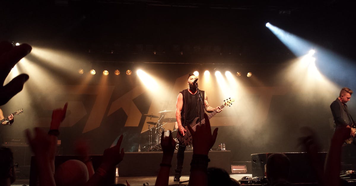 Where in London should you bring a fan of the band Madness? - Person Playing Guitar on Stage Where in London should you bring a fan of the band Madness? - Person Playing Guitar on Stage