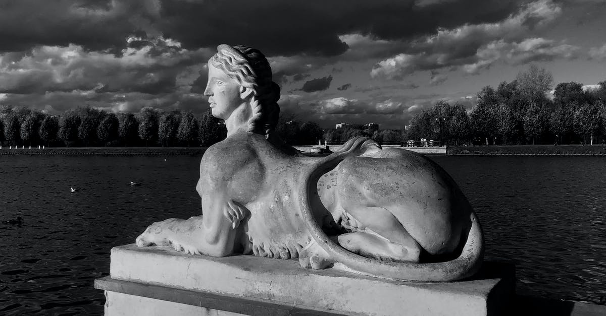 Where in Moscow is/was this 1980 Olympics logo sculpture located? - Black and white of sphinx statue located near rippling pond against cloudy sky in Tsaritsyno park Where in Moscow is/was this 1980 Olympics logo sculpture located? - Black and white of sphinx statue located near rippling pond against cloudy sky in Tsaritsyno park