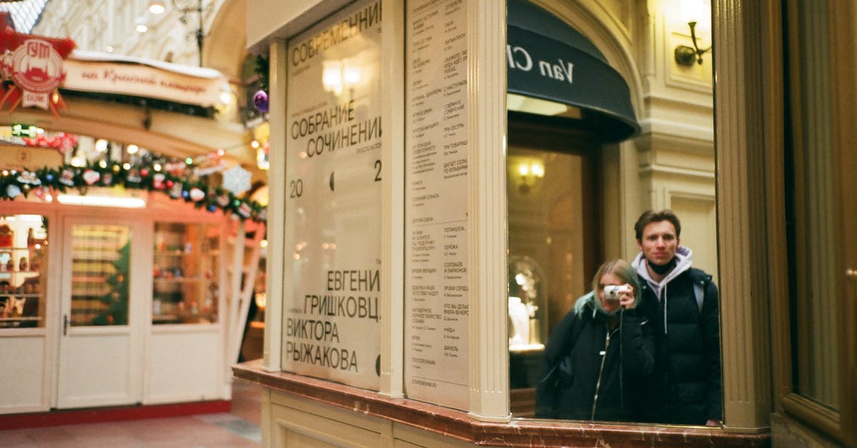 Where in Russia can I pay to shoot an AK-47? - Couple taking picture and reflecting in mirror on street Where in Russia can I pay to shoot an AK-47? - Couple taking picture and reflecting in mirror on street