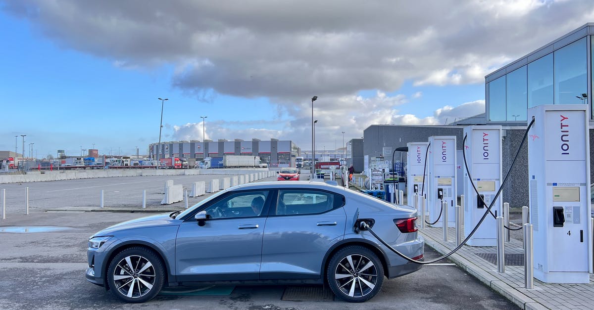 Where in Switzerland can you refill a gas cylinder? - Blue Sedan Parked on Gray Concrete Road Where in Switzerland can you refill a gas cylinder? - Blue Sedan Parked on Gray Concrete Road