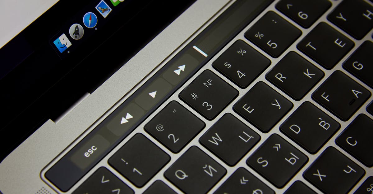 Where in the world knowing Russian and English will not be enough? [closed] - Black computer keyboard buttons with white signs