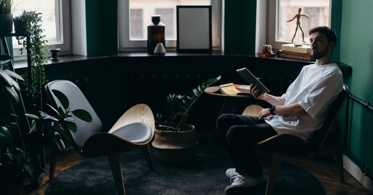 Where in Tokyo can I sell/give-away US electronics (specifically home appliances)? - Photo of Man Wearing White T-Shirt While Holding an Ipad Where in Tokyo can I sell/give-away US electronics (specifically home appliances)? - Photo of Man Wearing White T-Shirt While Holding an Ipad