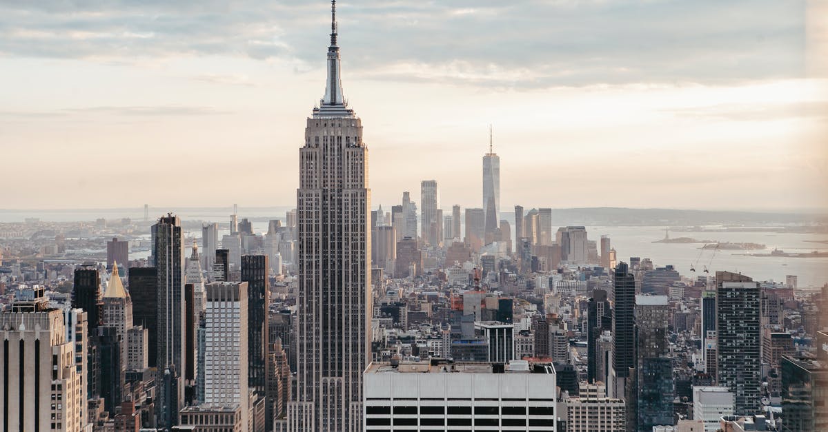 Where is the Hanuatu Island complex? - Empire State Building near multistage houses against ocean Where is the Hanuatu Island complex? - Empire State Building near multistage houses against ocean