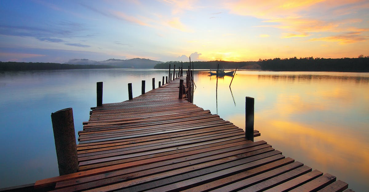 Where is the jetty where you take the boat to visit the Embera communities? - Brown Wooden Dock on Calm Body of Water Surrounded by Silhouette of Trees during Sunset Where is the jetty where you take the boat to visit the Embera communities? - Brown Wooden Dock on Calm Body of Water Surrounded by Silhouette of Trees during Sunset