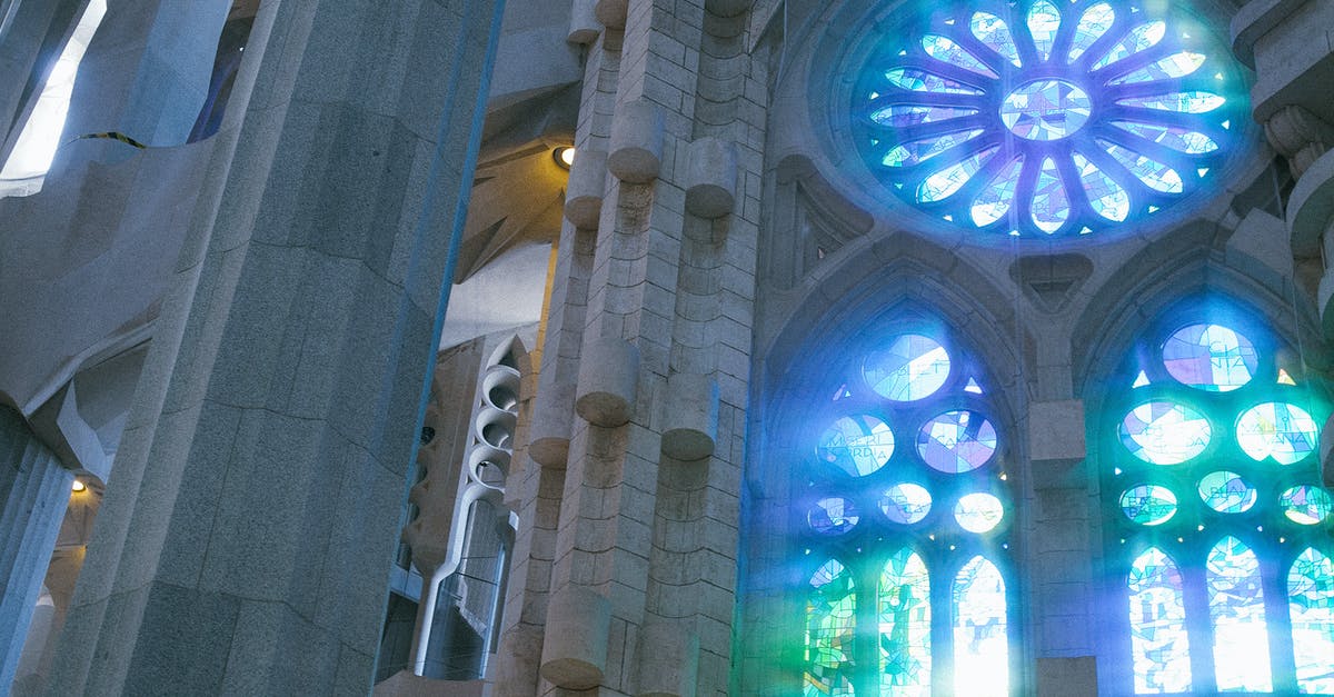 Where Is the Lugang Glass Temple? - Low angle of old catholic basilica with stained glass windows named Sagrada Familia located in Barcelona in Spain Where Is the Lugang Glass Temple? - Low angle of old catholic basilica with stained glass windows named Sagrada Familia located in Barcelona in Spain