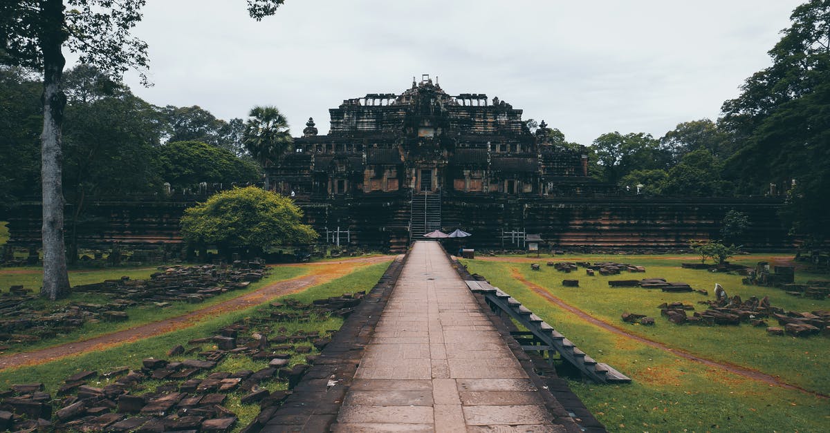 Where is the "Office for Foreign Aliens" in Siem Reap, Cambodia? - Brown Concrete Building Near Green Grass Field Where is the "Office for Foreign Aliens" in Siem Reap, Cambodia? - Brown Concrete Building Near Green Grass Field