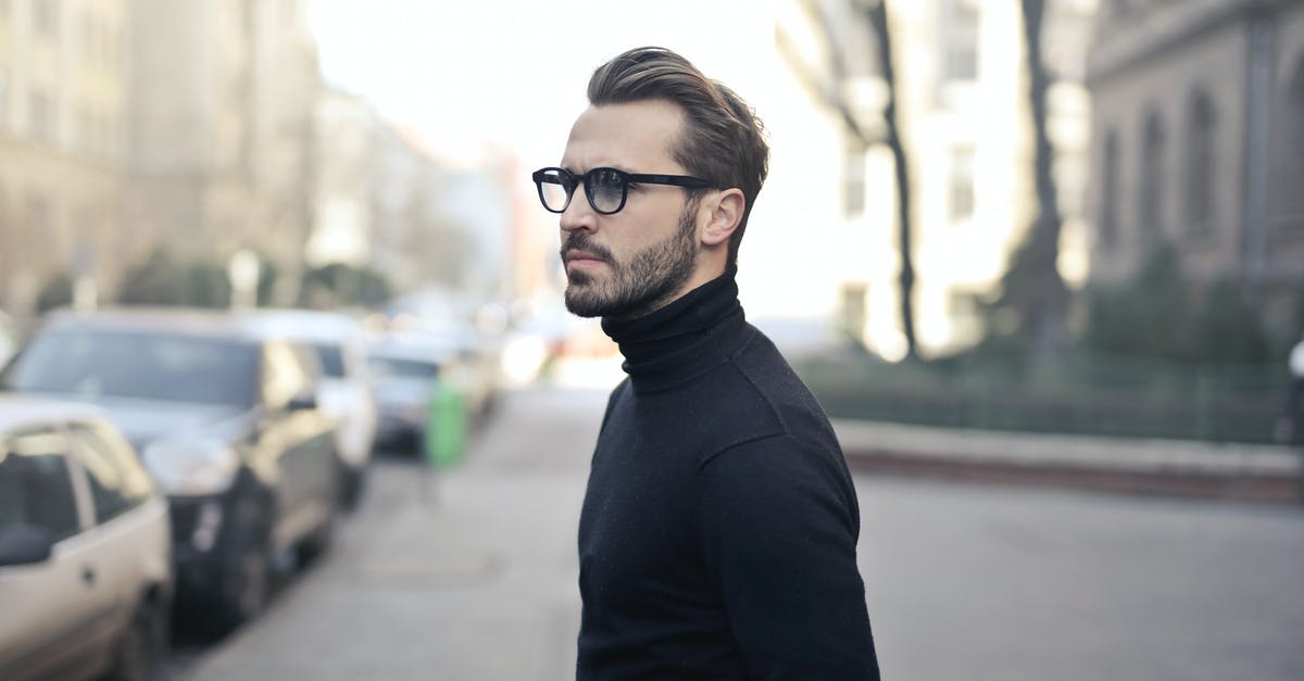 Where should I look for cheap renting cars in USA? - Man Standing on Street Where should I look for cheap renting cars in USA? - Man Standing on Street