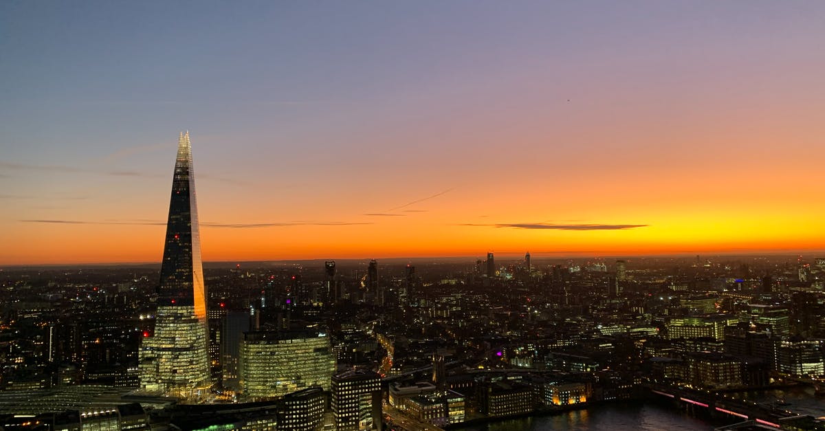Where should I stay in London with an early Heathrow departure? - City Skyline during Sunset With Body of Water Where should I stay in London with an early Heathrow departure? - City Skyline during Sunset With Body of Water